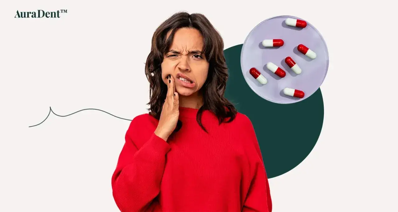 Kvinna med tandvärk håller handen mot kinden, bredvid en skål med kapslar som kan symbolisera tandinfektion och antibiotika.